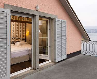 Deluxe Zimmer mit Seesicht und Terrasse