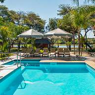 Ein Bungalow in der grünen Natur in der Okavango Region 